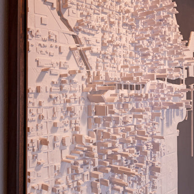 Close-up of Microscape's downtown Chicago model bonded to a 36" x 36", 1/8" thick plate of aluminum. The aluminum forms the surface of Lake Michigan and the Chicago River.