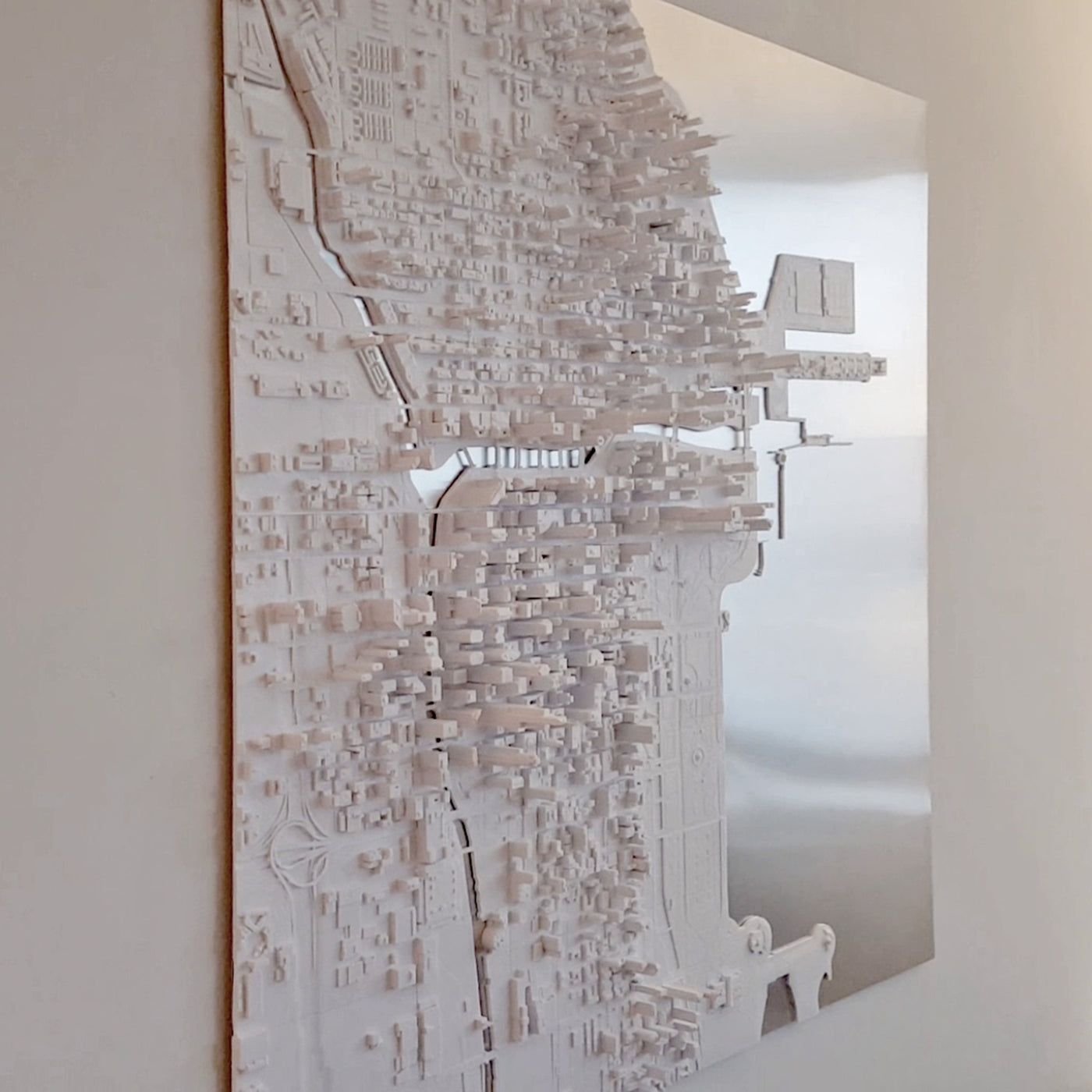 Microscape's downtown Chicago model on metal. The metal forms the surface of Lake Michigan and the Chicago River.